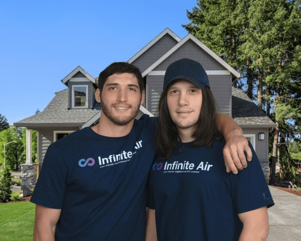image of two hvac techs with infinite air shirts in front of a home